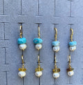 Aretes perla/larimar y perla/ Ámbar.